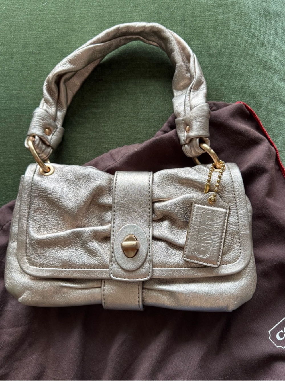 Coach Gold leather evening purse
No A0969-13462 - Picture 4 of 4